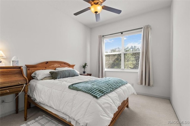 bedroom featuring ceiling fan and carpet flooring