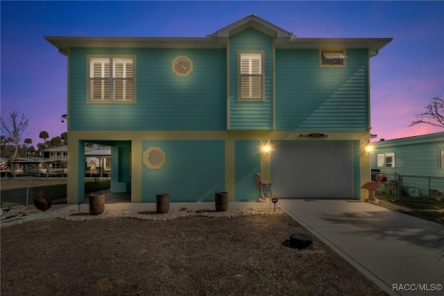 view of front of home with a garage