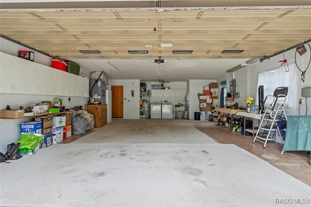 3550 S Dean Ter, Inverness, FL 34452 - garage featuring separate washer and dryer and water heater