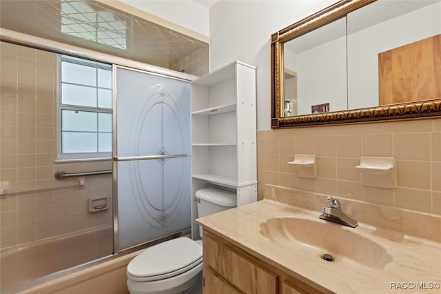 3550 S Dean Ter, Inverness, FL 34452 - bathroom featuring vanity and bath / shower combo with glass door