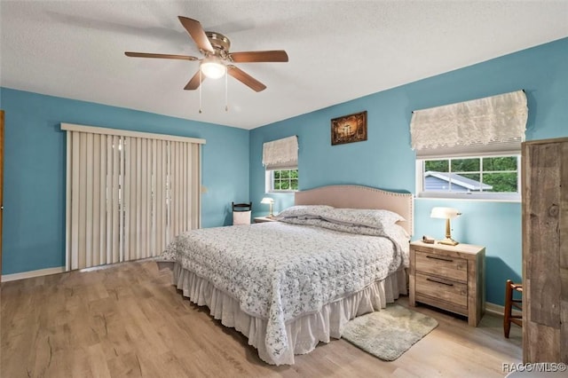 3550 S Dean Ter, Inverness, FL 34452 - bedroom featuring light wood-type flooring, ceiling fan, and a textured ceiling