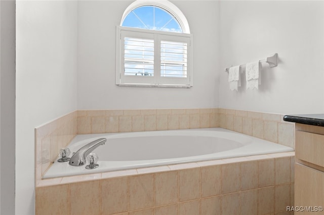 3874 E Lake Todd Dr, Hernando, FL 34442 - full bathroom featuring a garden tub and vanity