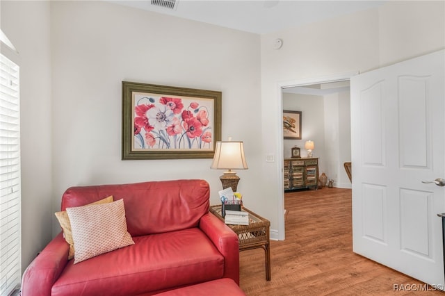 living area featuring hardwood / wood-style flooring