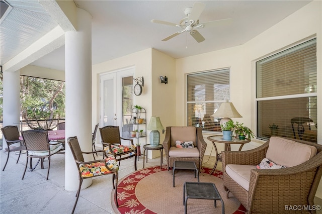 interior space featuring ceiling fan and french doors