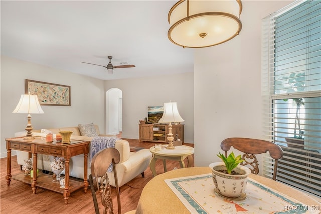 sitting room featuring ceiling fan and hardwood / wood-style floors