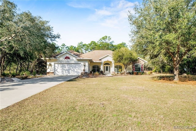 single story home featuring a garage and a front lawn