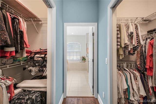 spacious closet with tile patterned flooring