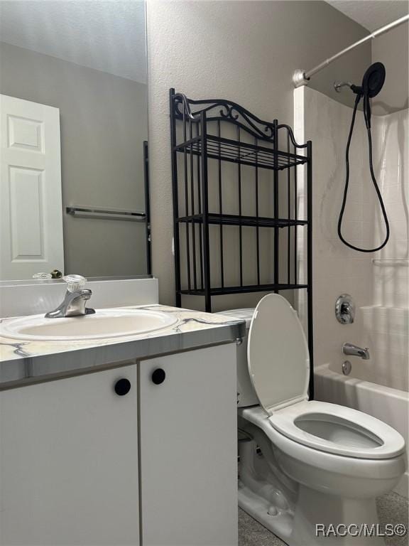 full bathroom featuring vanity,  shower combination, and toilet