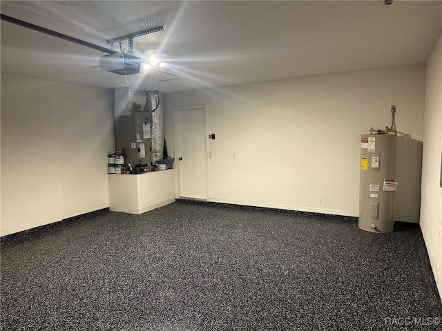 garage with heating unit, water heater, and a garage door opener