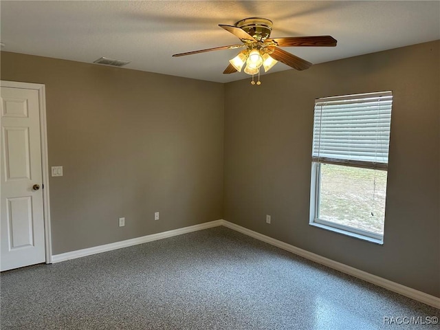 spare room featuring ceiling fan