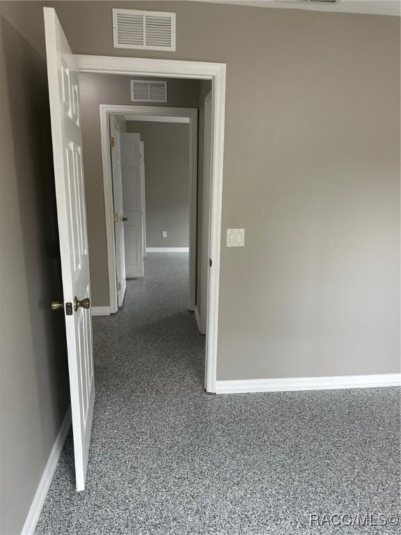 hall with carpet floors