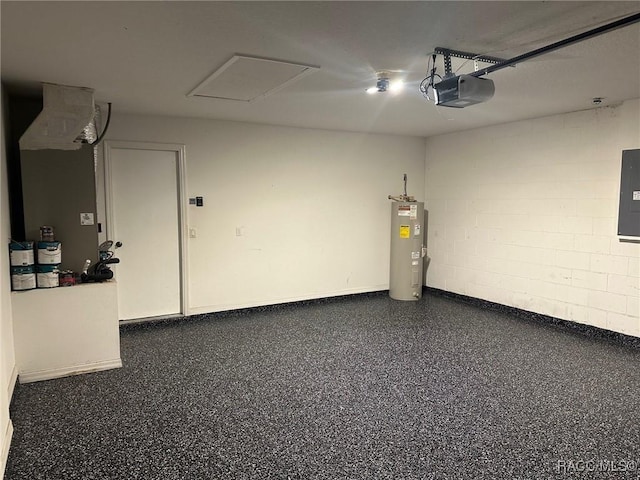 garage featuring electric panel, electric water heater, and a garage door opener