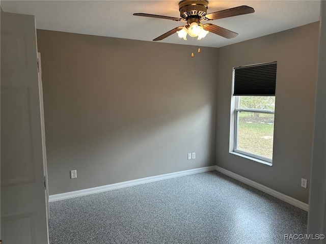 spare room featuring ceiling fan