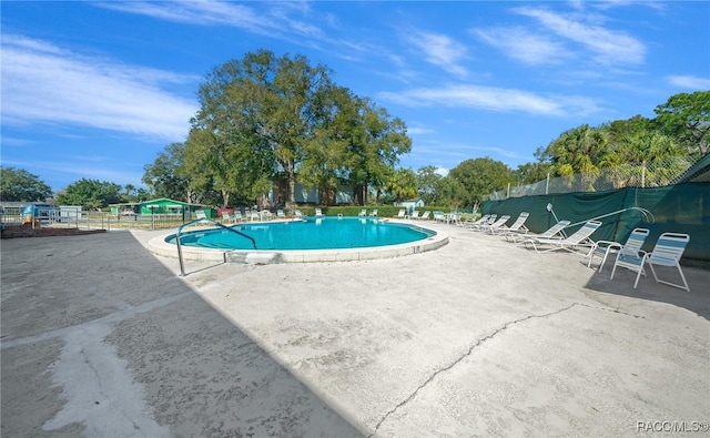 8917 SW 101st Ln, Ocala, FL 34481 - pool with fence and a patio area