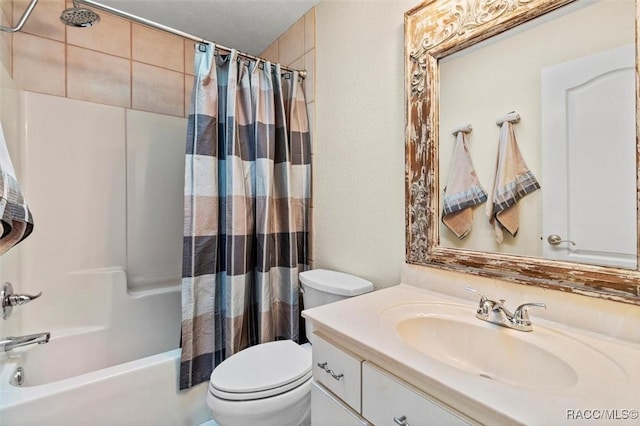 bathroom with toilet, shower / tub combo with curtain, and vanity