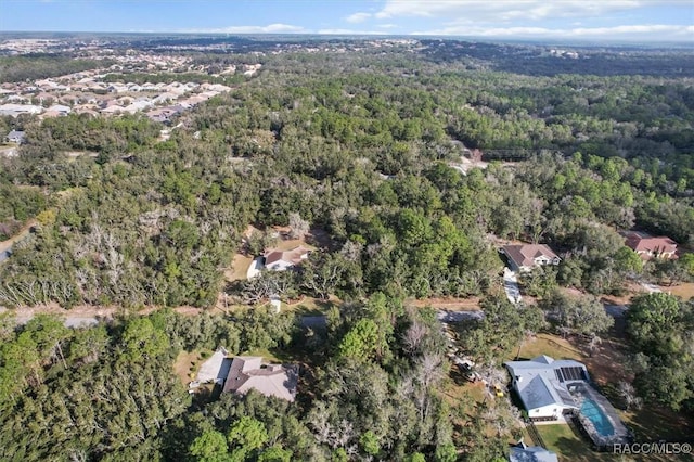 aerial view featuring a forest view