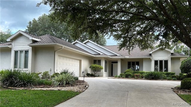 ranch-style home with a garage