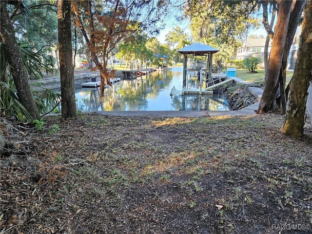 view of dock with a water view