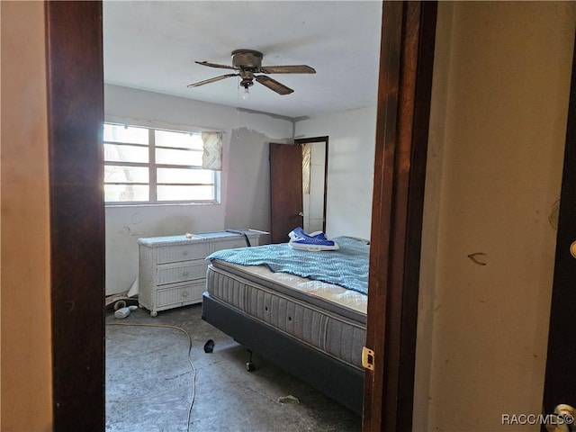 bedroom featuring ceiling fan