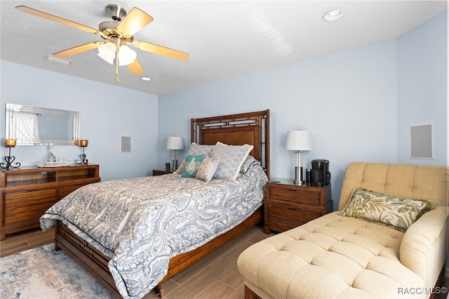5705 N Bedstrow Blvd, Beverly Hills, FL 34465 - bedroom with wood finished floors, ceiling fan, and recessed lighting