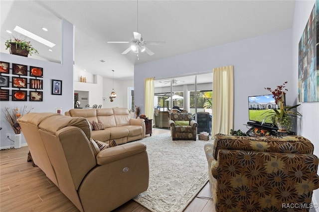 5705 N Bedstrow Blvd, Beverly Hills, FL 34465 - living area with a ceiling fan, light wood-style floors, and high vaulted ceiling