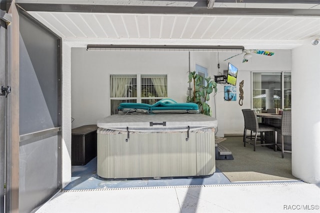 5705 N Bedstrow Blvd, Beverly Hills, FL 34465 - view of patio / terrace featuring a hot tub