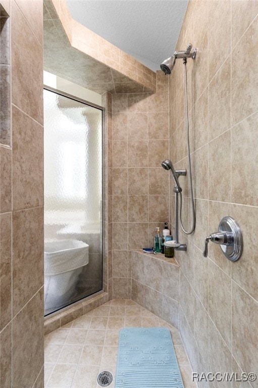 5705 N Bedstrow Blvd, Beverly Hills, FL 34465 - bathroom with a shower stall and tile patterned floors