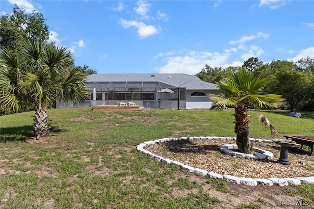 5705 N Bedstrow Blvd, Beverly Hills, FL 34465 - view of grassy yard with a lanai