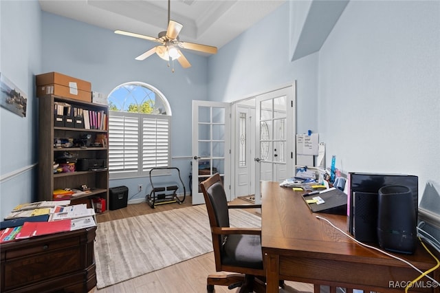 5705 N Bedstrow Blvd, Beverly Hills, FL 34465 - home office with a high ceiling, wood finished floors, ceiling fan, and french doors