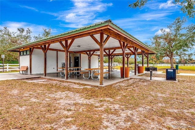 view of home's community with an outdoor structure