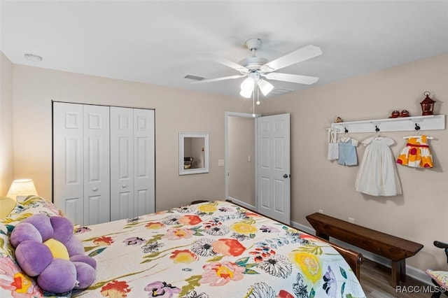9973 N Chelic Dr, Citrus Springs, FL 34434 - bedroom with a closet, ceiling fan, and wood finished floors