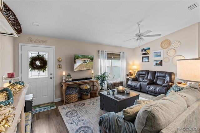 9973 N Chelic Dr, Citrus Springs, FL 34434 - living room featuring ceiling fan, wood finished floors, vaulted ceiling, and baseboards