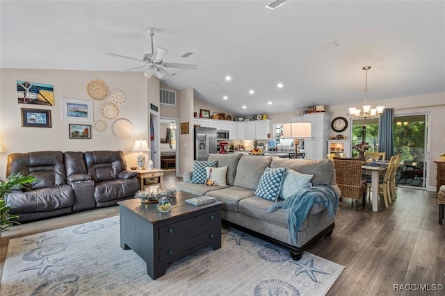 9973 N Chelic Dr, Citrus Springs, FL 34434 - living area with a chandelier, light wood finished floors, a ceiling fan, lofted ceiling, and recessed lighting