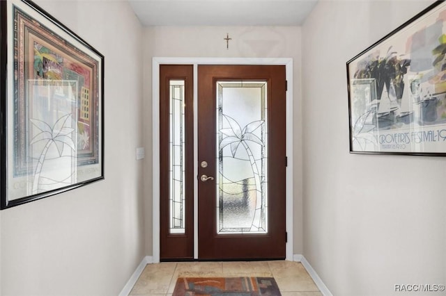 view of tiled entrance foyer