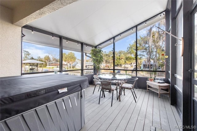 sunroom with plenty of natural light