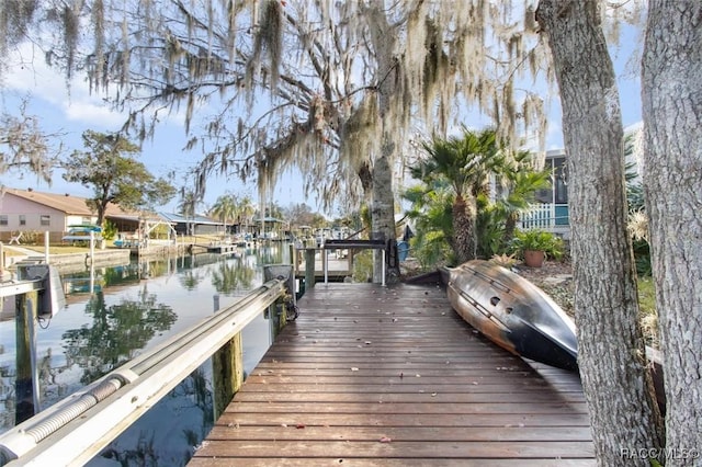 view of dock with a water view