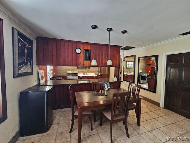 tiled dining space with ornamental molding