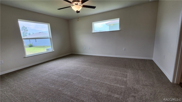 carpeted empty room with ceiling fan