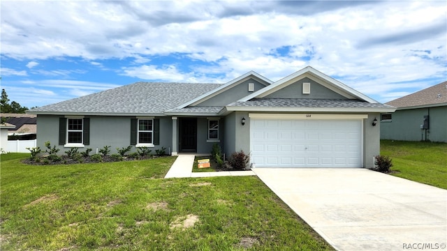 single story home featuring a front yard and a garage