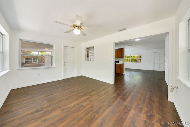 7 N Adams St, Beverly Hills, FL 34465 - unfurnished living room with dark wood-type flooring and a ceiling fan