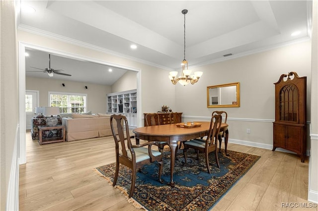 1200 N Annapolis Ave, Hernando, FL 34442 - dining room featuring light wood finished floors, a chandelier, ceiling fan, a tray ceiling, and recessed lighting