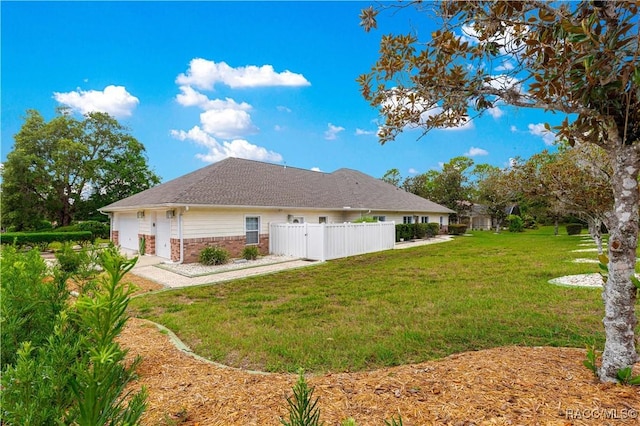 1200 N Annapolis Ave, Hernando, FL 34442 - rear view of house with brick siding and an attached garage