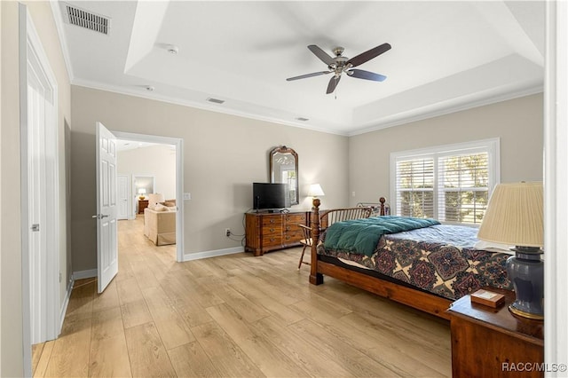 1200 N Annapolis Ave, Hernando, FL 34442 - bedroom with a raised ceiling, light wood-type flooring, ornamental molding, and ceiling fan