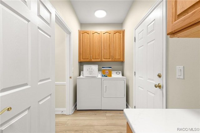 1200 N Annapolis Ave, Hernando, FL 34442 - washroom featuring light wood finished floors, independent washer and dryer, and cabinet space