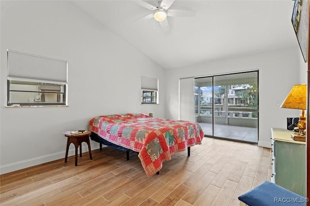 bedroom featuring lofted ceiling, hardwood / wood-style floors, access to exterior, and ceiling fan