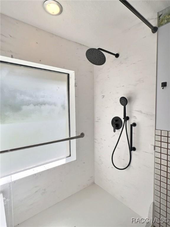 bathroom with walk in shower