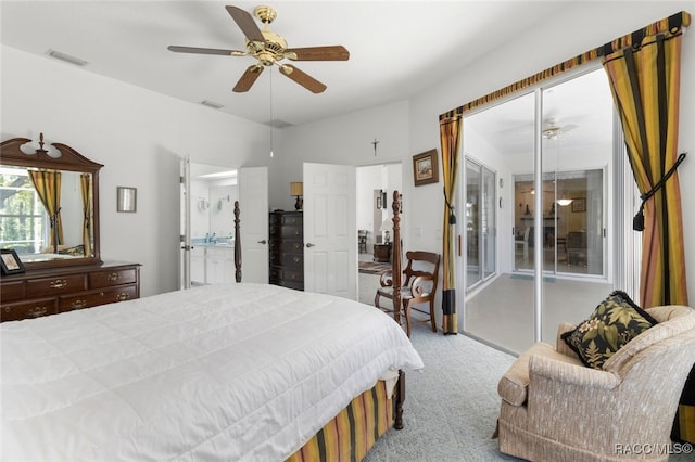 carpeted bedroom featuring ceiling fan, access to exterior, and visible vents