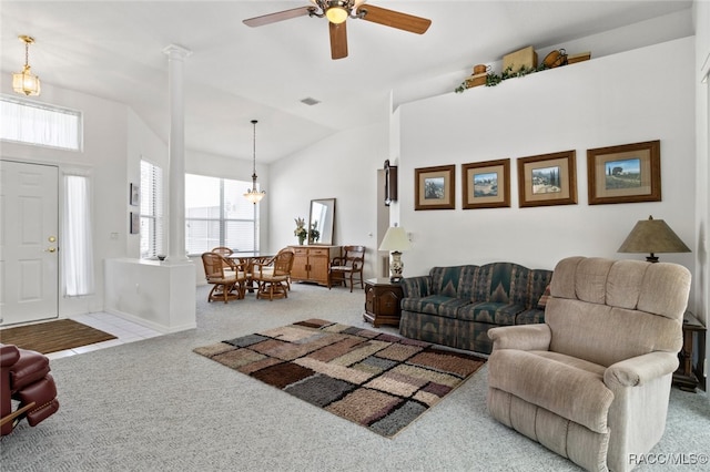 living room with carpet floors, a ceiling fan, and lofted ceiling