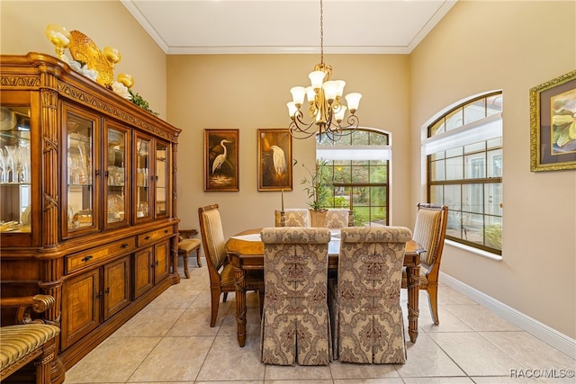 tiled dining room with crown molding and an inviting chandelier