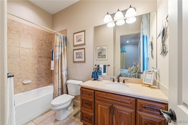 full bathroom with tile patterned floors, shower / tub combo with curtain, vanity, and toilet